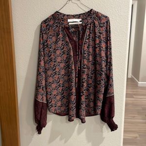 Leightweight long sleeve blouse. Can be worn at work or church in summer.